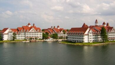 The exterior of Disney's Grand Floridian Resort & Spa in front of Seven Seas Lagoon