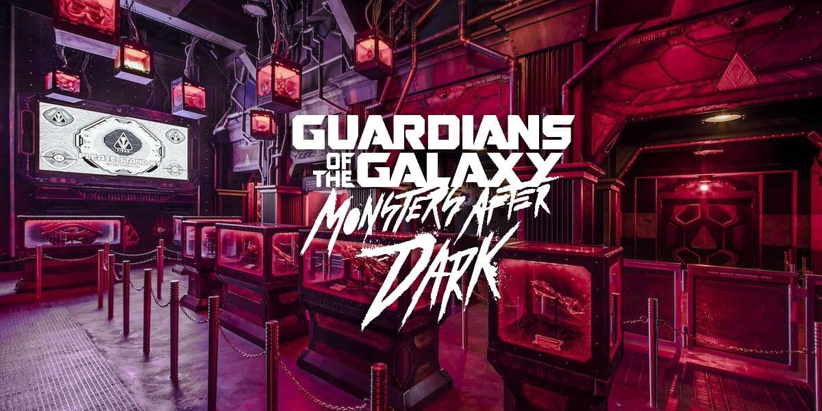 Futuristic, neon-lit room with "Guardians of the Galaxy: Monsters After Dark" logo in bold white text overlay. Queue stanchions and themed sci-fi decor fill the space. Large screen and industrial lights are visible.