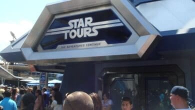 Crowds gather outside the entrance to the "Star Tours: The Adventures Continue" attraction at Disneyland.
