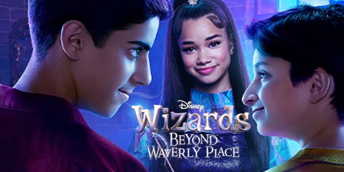 Three teens stand in a magical setting. Two boys face each other, while a girl with long dark hair stands smiling in the background. The text reads, "Disney Wizards: Beyond Waverly Place.