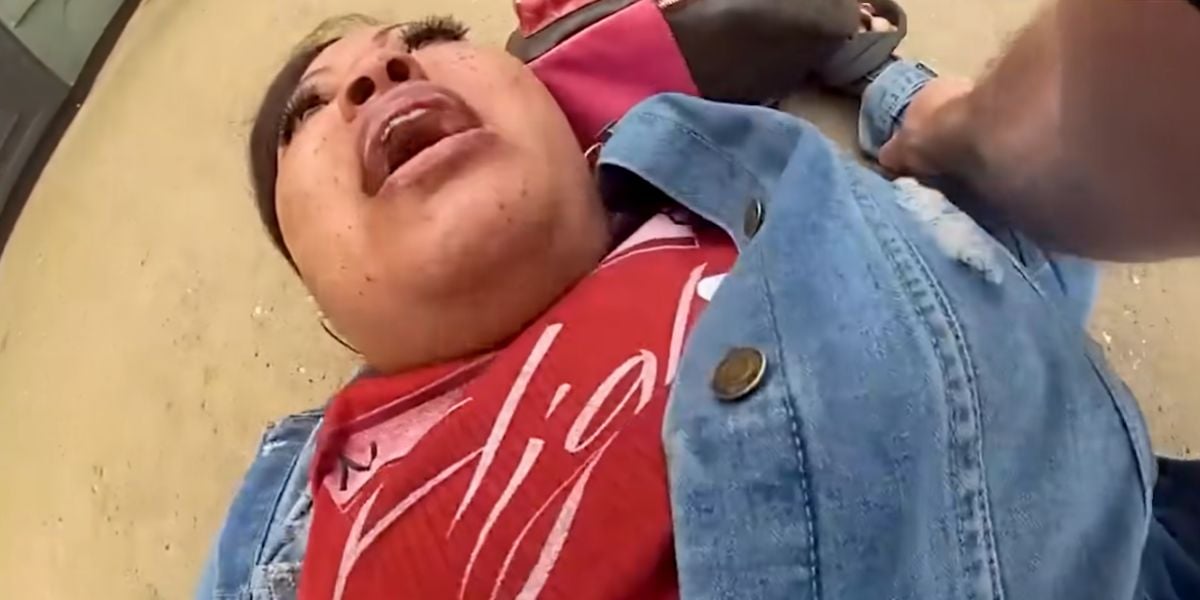 A woman tackled by police at Universal Orlando Resort.