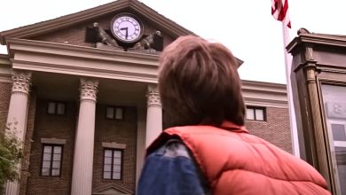 Marty McFly (Michael J. Fox) looking up at the watch tower in 'Back to the Future' (1985)