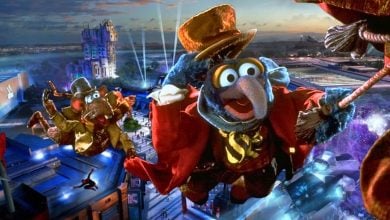 Mixed image: Avengers Campus concept art in the background with Gonzo and Rizzo flying in 'The Muppet Christmas Carol' in the foreground