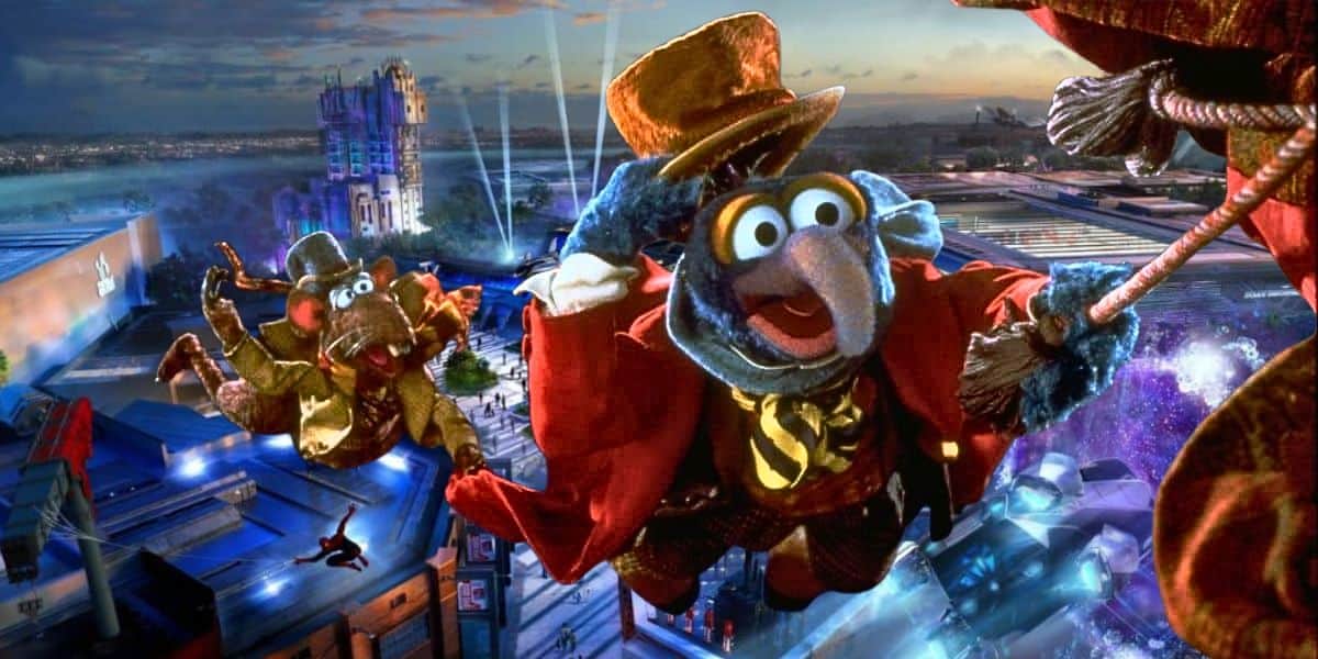 Mixed image: Avengers Campus concept art in the background with Gonzo and Rizzo flying in 'The Muppet Christmas Carol' in the foreground