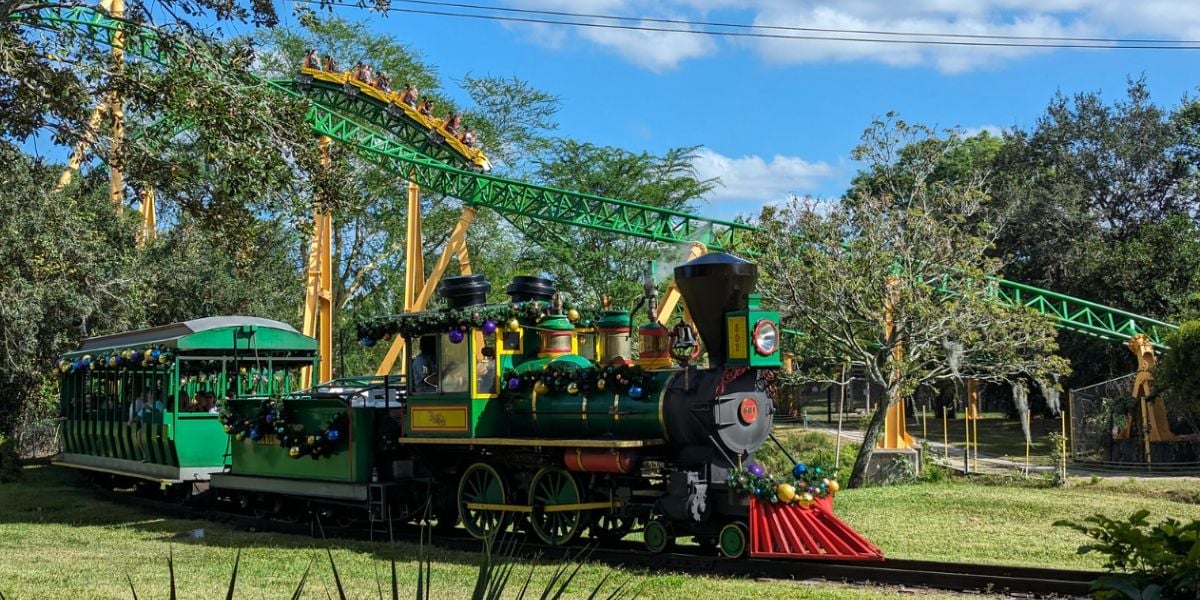 A roller coaster and a train at Busch Gardens Tampa Bay.