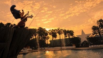 A statue of Mickey Mouse as a sorcerer stands at the Fantasia Kiddie Pool at Walt Disney World Resort's All-Star Movies Resort.