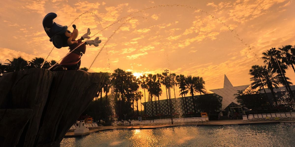 A statue of Mickey Mouse as a sorcerer stands at the Fantasia Kiddie Pool at Walt Disney World Resort's All-Star Movies Resort.
