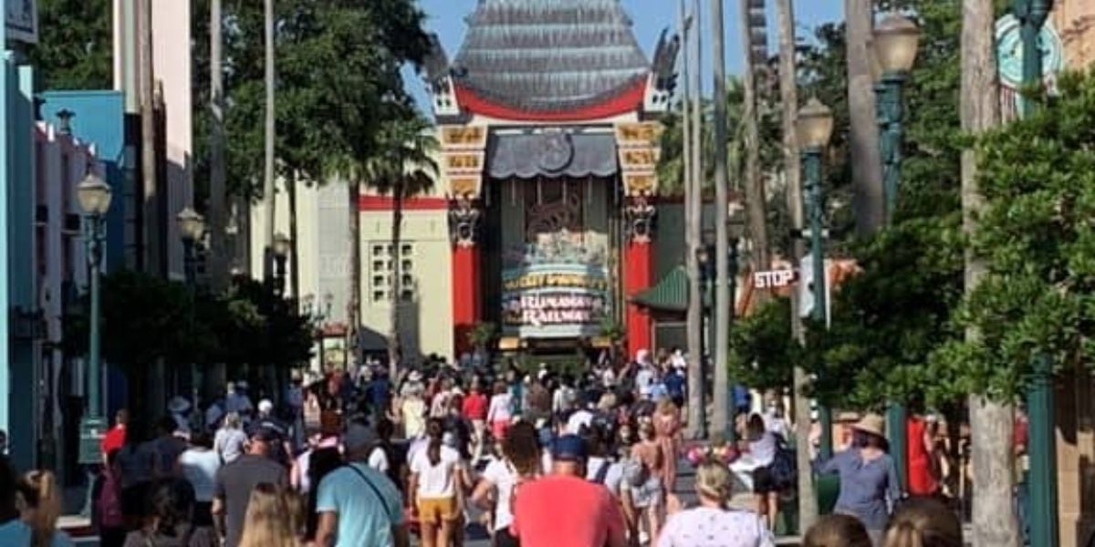 Crowds walking in front of the Chinese Theatre at Disney's Hollywood Studios.