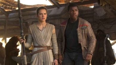 Rey and Finn in front of ship