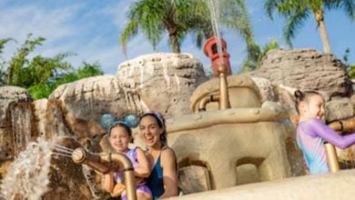 three guests at disney world's typhoon lagoon water park