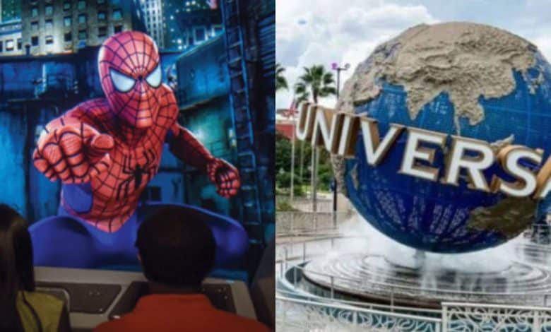 Two people view a large screen showing Spider-Man in action on the left; on the right is the iconic Universal Studios globe with gold lettering and palm trees in the background.