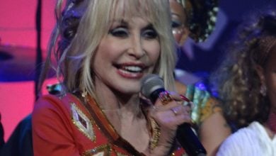 Dolly Parton performing on stage at Dollywood.