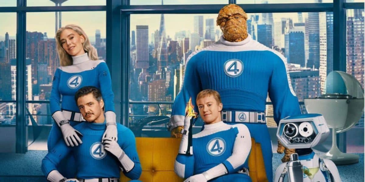 Four people in blue superhero costumes with the number "4" pose together in a city apartment. One is rocky and large, another holds a flame, and a small robot stands beside them. The city skyline is visible through the window.