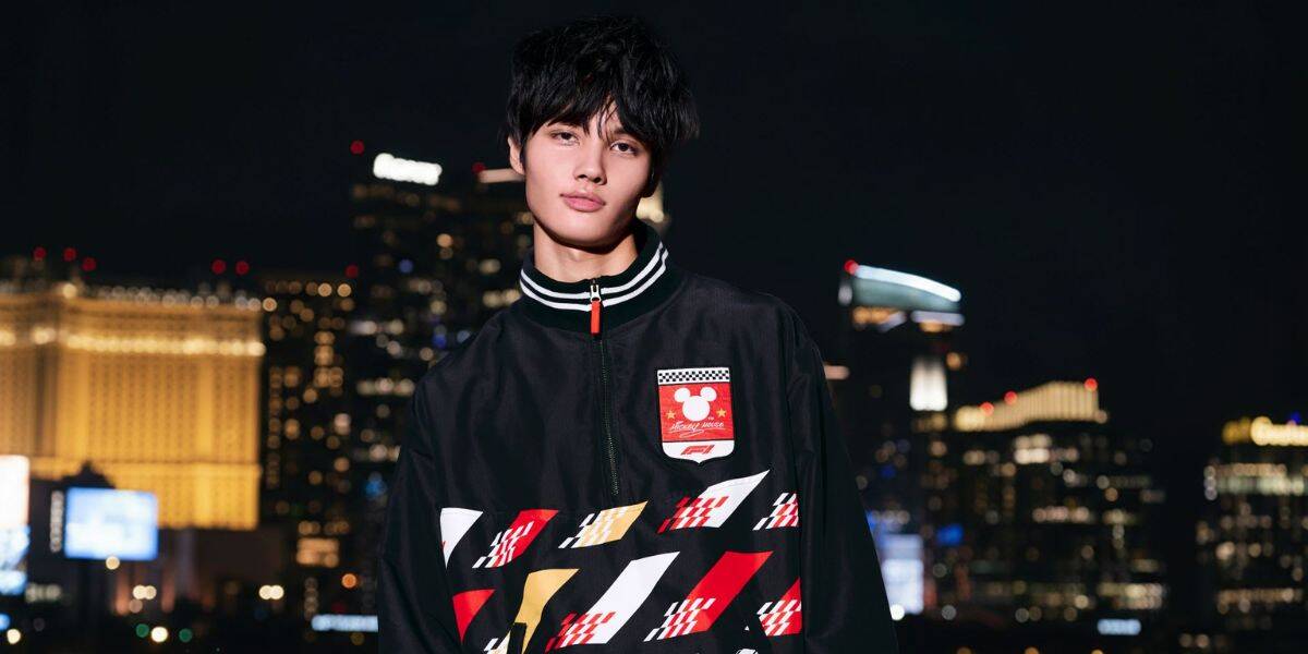 A young man with dark hair wearing the Fuel the Magic jacket.