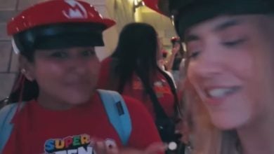 Two women in line for Mario Kart: Bowsers Challenge at Epic Universe.
