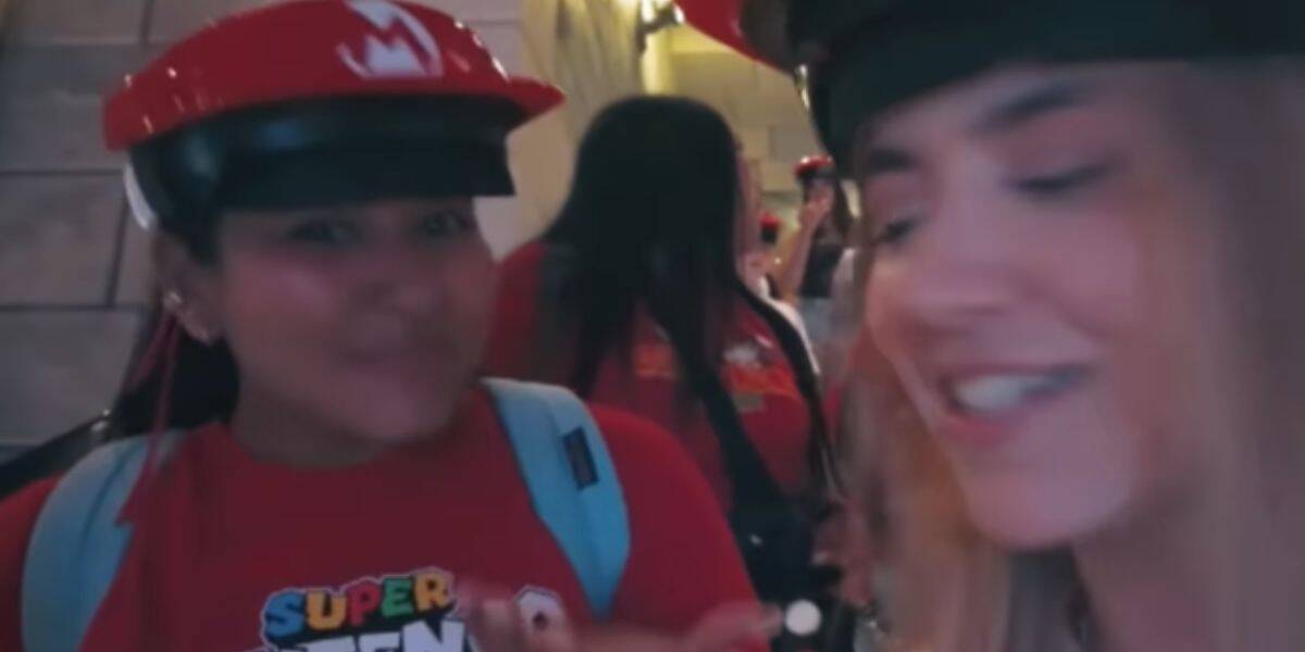 Two women in line for Mario Kart: Bowsers Challenge at Epic Universe.
