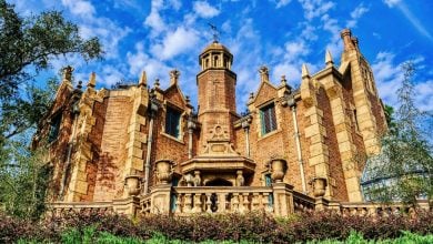 Haunted Mansion against a sunny sky at Magic Kingdom