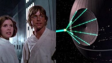 On the left, a woman and a man in white clothing look concerned in a spaceship hallway. On the right, a large, gray, spherical space station fires a green laser beam.