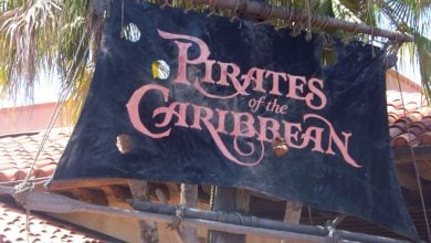 The Pirates of the Caribbean ride entrance sign at Magic Kingdom Park.