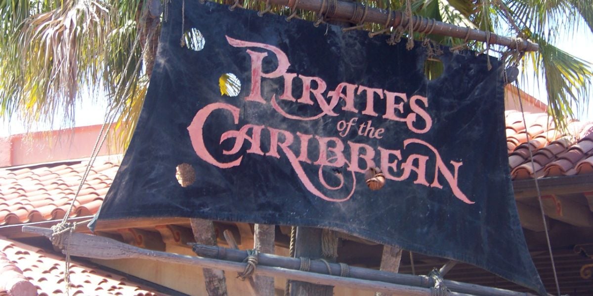 The Pirates of the Caribbean ride entrance sign at Magic Kingdom Park.