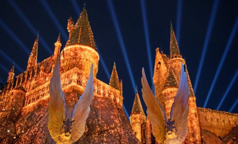 Hogwarts Castle lit up at night in the Wizarding World of Harry Potter at Universal Studios Beijing