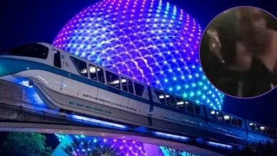 A screenshot from a bodycam video of an arrest at Disney's BoardWalk Inn is edited into a circle on top of an image of the Monorail going past Spaceship Earth at EPCOT at night.