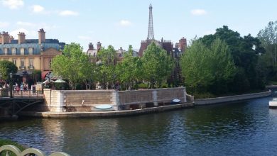 A friendship boat in front of the France World Showcase Pavilion in EPCOT at Walt Disney World Resort.
