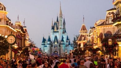 People walking down Main Street, U.S.A., during Mickey's Very Merry Christmas Party at Walt Disney World Resort.