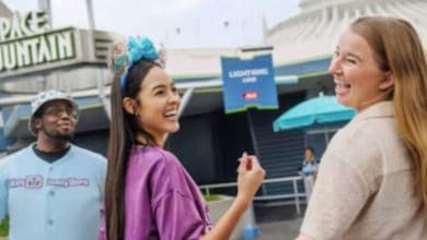 Disney guests in front of Magic Kingdom's Space Mountain entrance