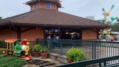 The train and Disney Pin Traders store at Disney Springs.