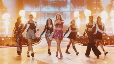 Taylor Swift sings "Bad Blood" onstage at the Eras Tour, backed by several dancers