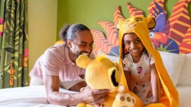 Disney World hotel guests in a Lion-King-themed room