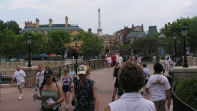 Guests walking in the World Showcase France Pavilion at EPCOT.