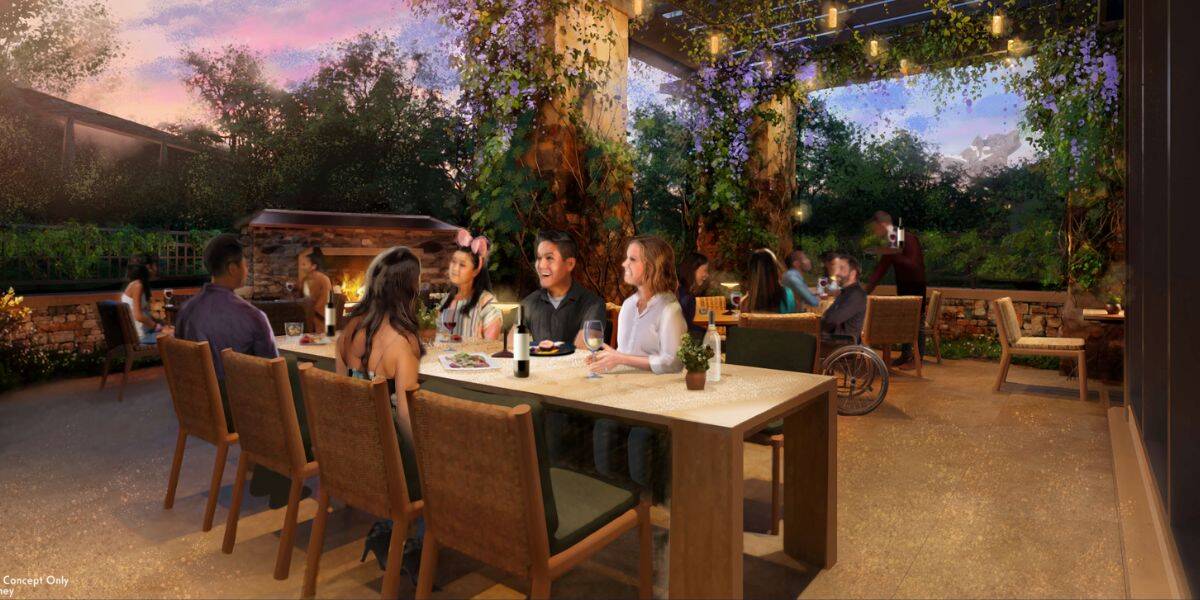 Theme park guests enjoy alfresco dining at sunset beneath twinkling string lights, surrounded by vibrant foliage and festive decor.