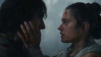 Rey (Daisy Ridley) holds Kylo Ren's (Adam Driver) face