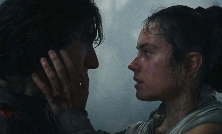 Rey (Daisy Ridley) holds Kylo Ren's (Adam Driver) face