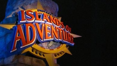 Universal Islands of Adventure lighthouse at night.