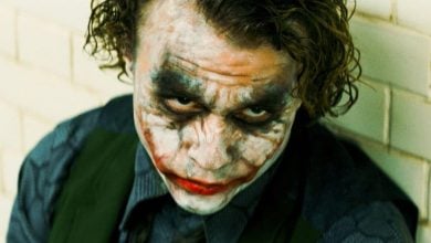 The Joker (Heath Ledger) taunting a police offer in 'The Dark Knight'
