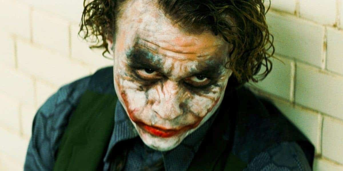 The Joker (Heath Ledger) taunting a police offer in 'The Dark Knight'