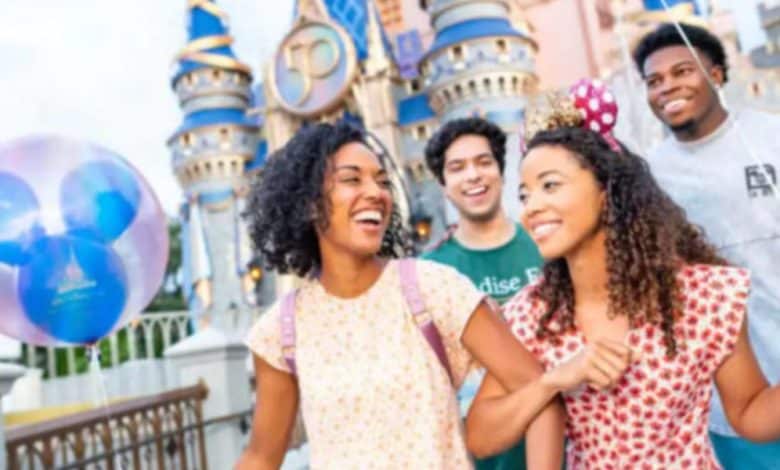 disney adults in front of Cinderella Castle in Magic Kingdom