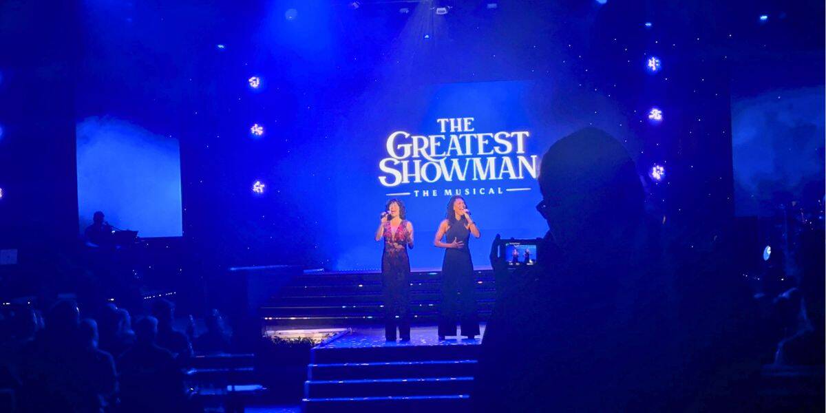 Two singers light up the stage at "The Greatest Showman: The Musical," leaving fans to debate its Disney Parks future beyond 2027.