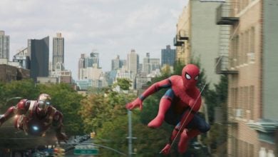 Iron Man (RDJ) flying after Spider-Man (Tom Holland) in Spider-Man: Homecoming MCU film