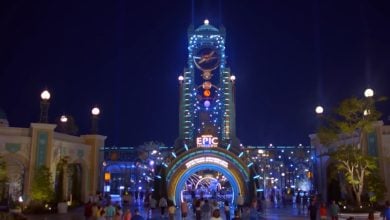 Universal's Epic Universe entrance lit up at night