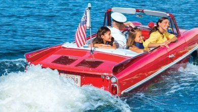 A red Amphicar on a ride at Disney Springs at Walt Disney World Resort