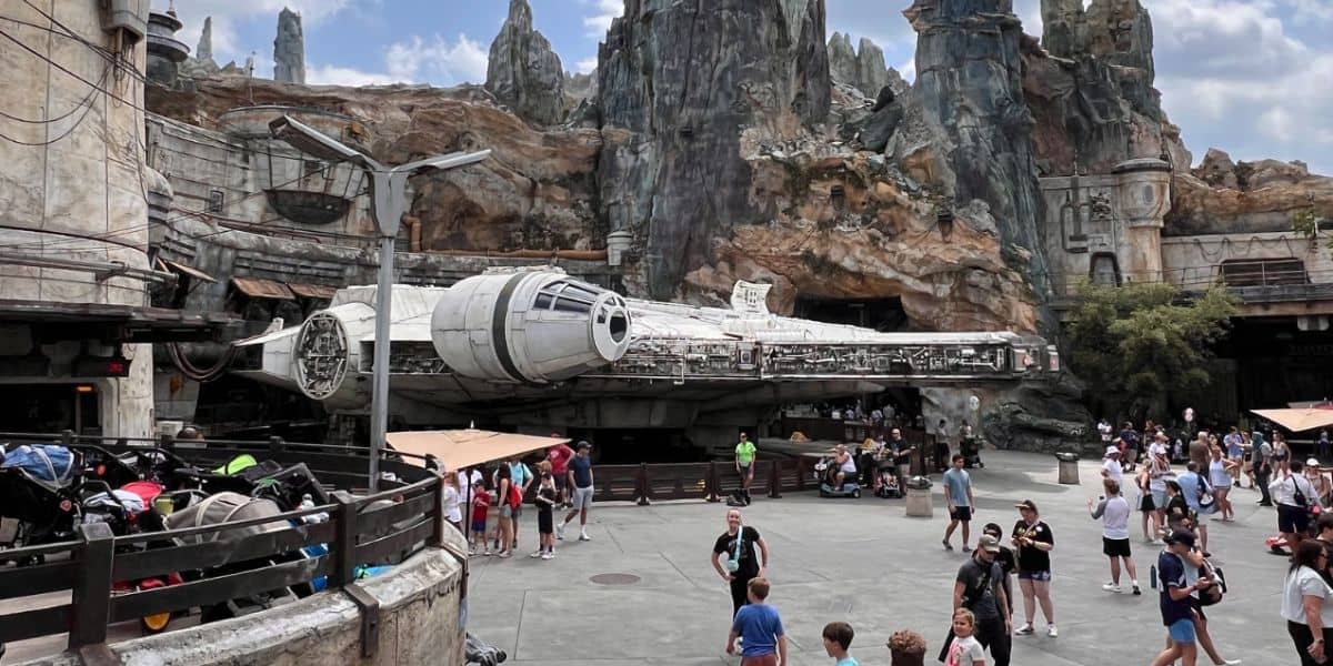The Millennium Falcon at Star Wars: Galaxy's Edge, surrounded by Disney World guests