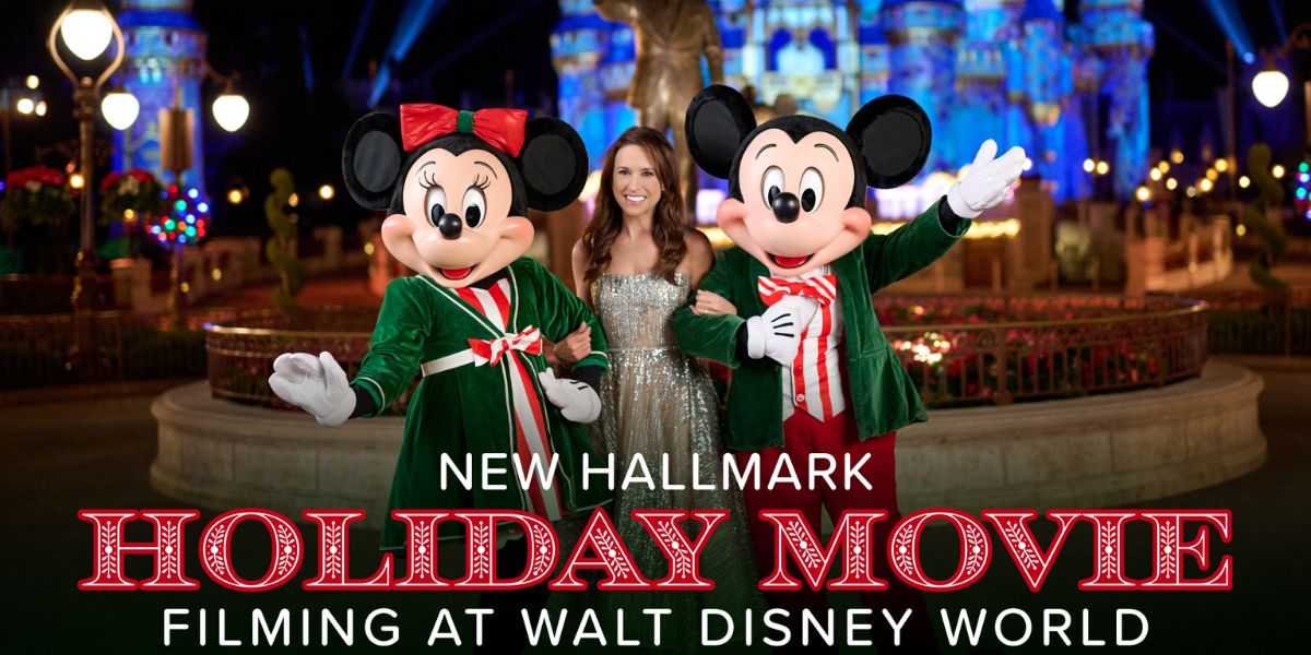 Minnie and Mickey Mouse in festive holiday attire at Disney World pose with a guest; text nods to Lacey Chabert’s Hallmark film.