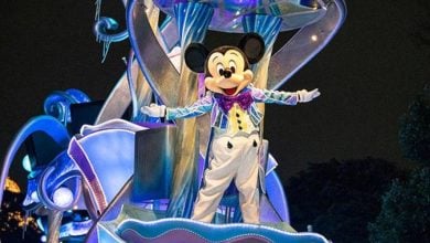 Mickey Mouse dazzles in a sparkling suit during Nightfall Glow
