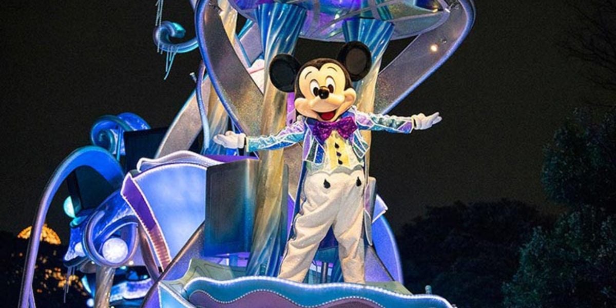 Mickey Mouse dazzles in a sparkling suit during Nightfall Glow