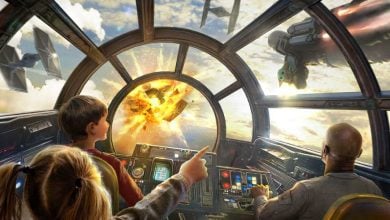 Guests in the Millennium Falcon cockpit on Smugglers’ Run experience a fiery space battle unfolding through the windshield.