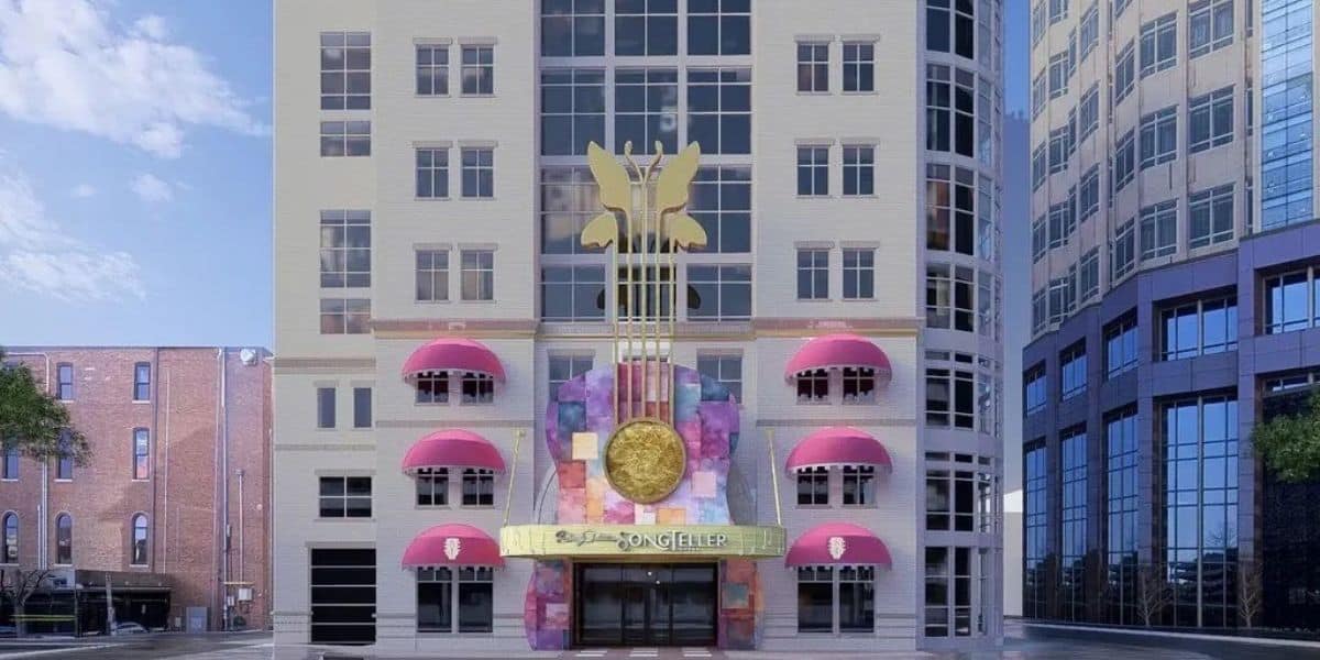 Hard Rock Hotel entrance with signature pink awnings and towering gold guitar, capturing the vibe of a music-themed resort.